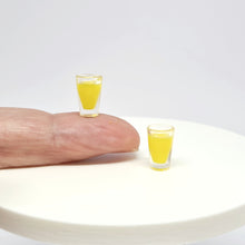 Load image into Gallery viewer, Two Miniature Glasses of Orange Juice
