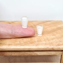 Load image into Gallery viewer, Two Miniature Glasses of Milk
